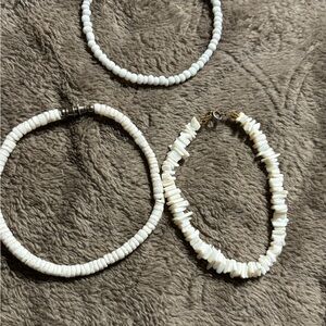 Elegant White Puka Beaded And Shell bracelets Set